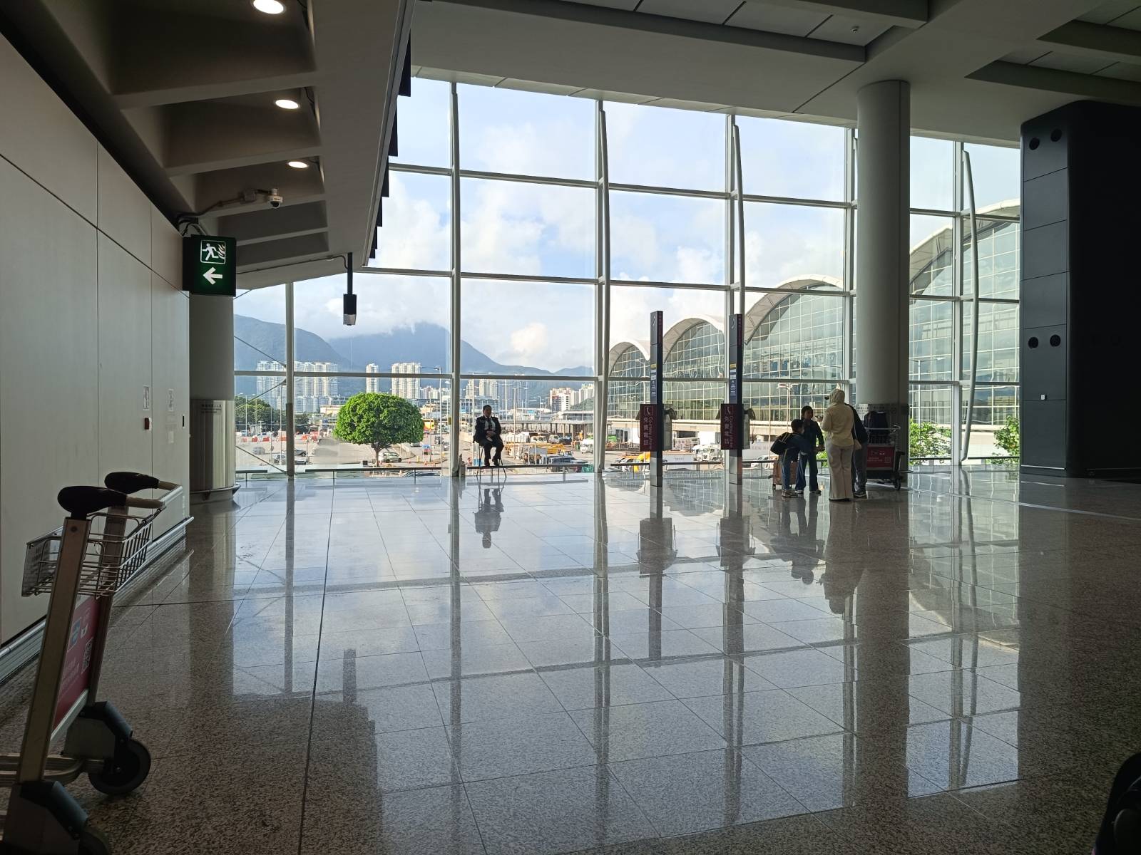 view of mountain ranges and buildings from HKG airport